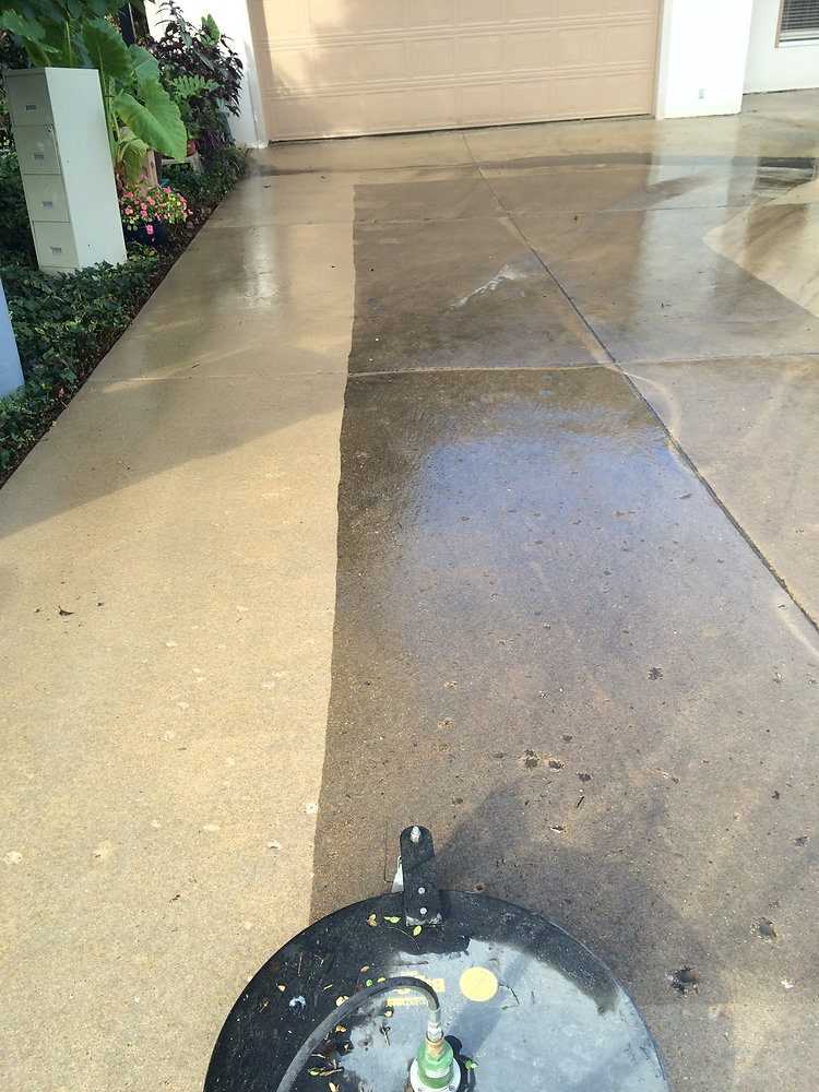 Concrete driveway pressure washing South Florida — surface cleaner removes black mold and stains